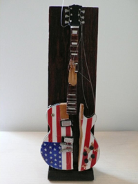 Miniature Stephen Colbert Smashed Guitar Sculpture Miniataure Stephen Colbert Smashed Guitar Sculpture